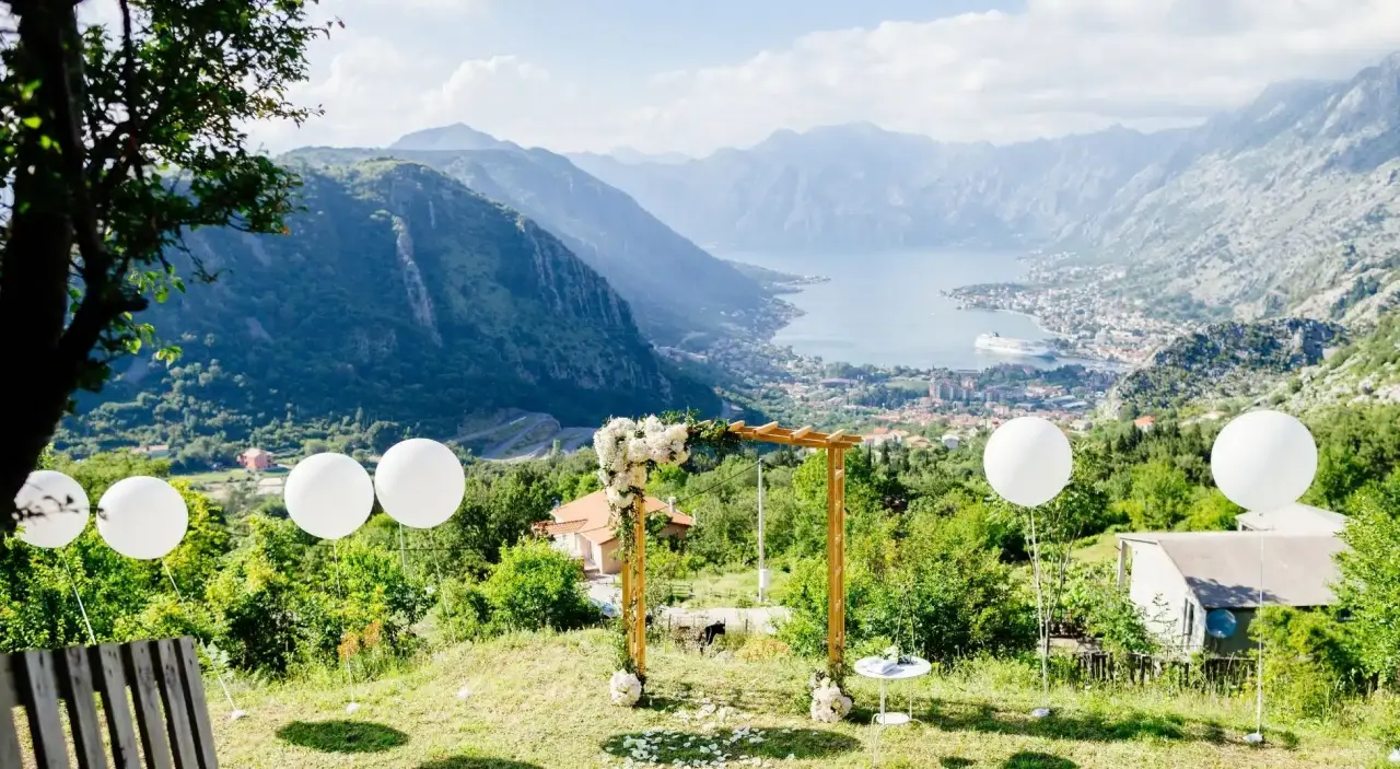 wedding arch with decorations and sea view