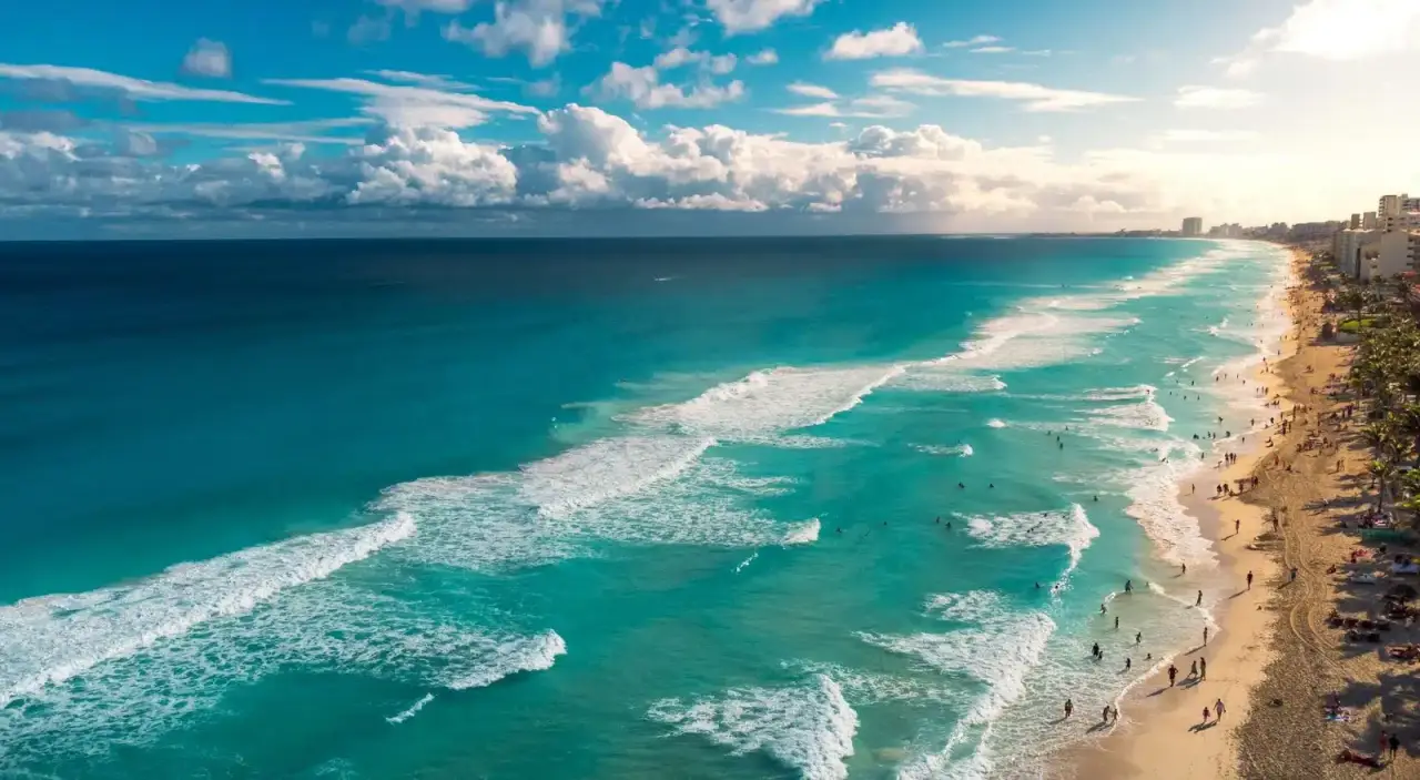 Waves rolling in at Playa Delfines in Cancun